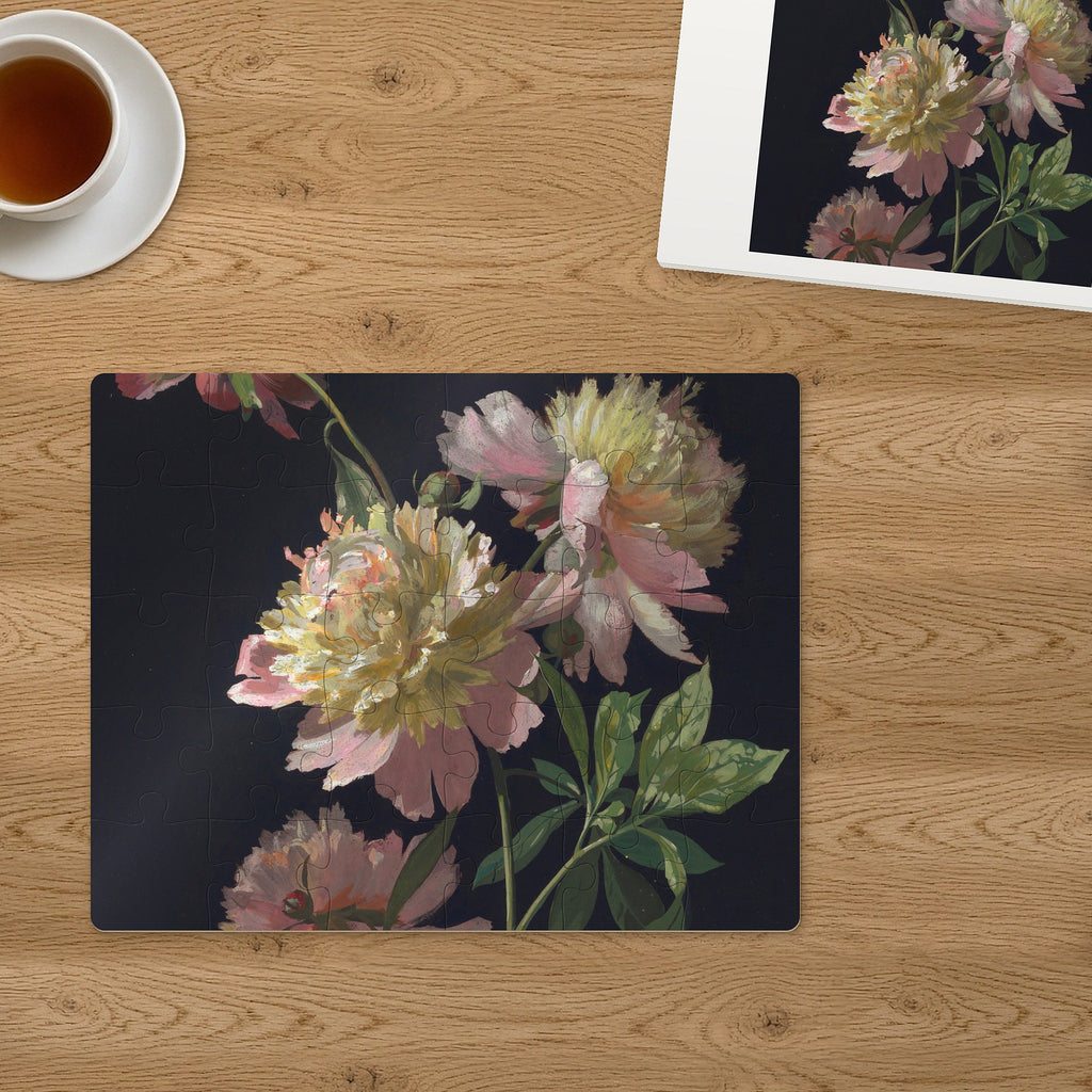 Memory Lane puzzle: Peonies in Bloom. The finished 30-piece 14″ × 11″ puzzle on a table beside its white gift box (product illustration)