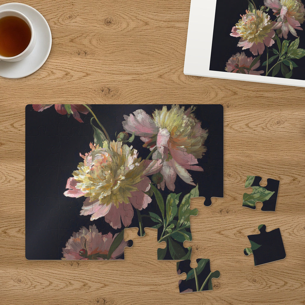 Memory Lane puzzle: Peonies in Bloom. Three of the 30 extra-large pieces, each about 2¼″ across, lifted out beside the puzzle (product illustration)