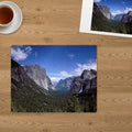 Memory Lane puzzle: Yosemite Valley View. The finished 30-piece 14″ × 11″ puzzle on a table beside its white gift box (product illustration)